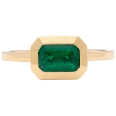 Rectangular-Cut Emerald and 18 Karat Yellow Gold Ring