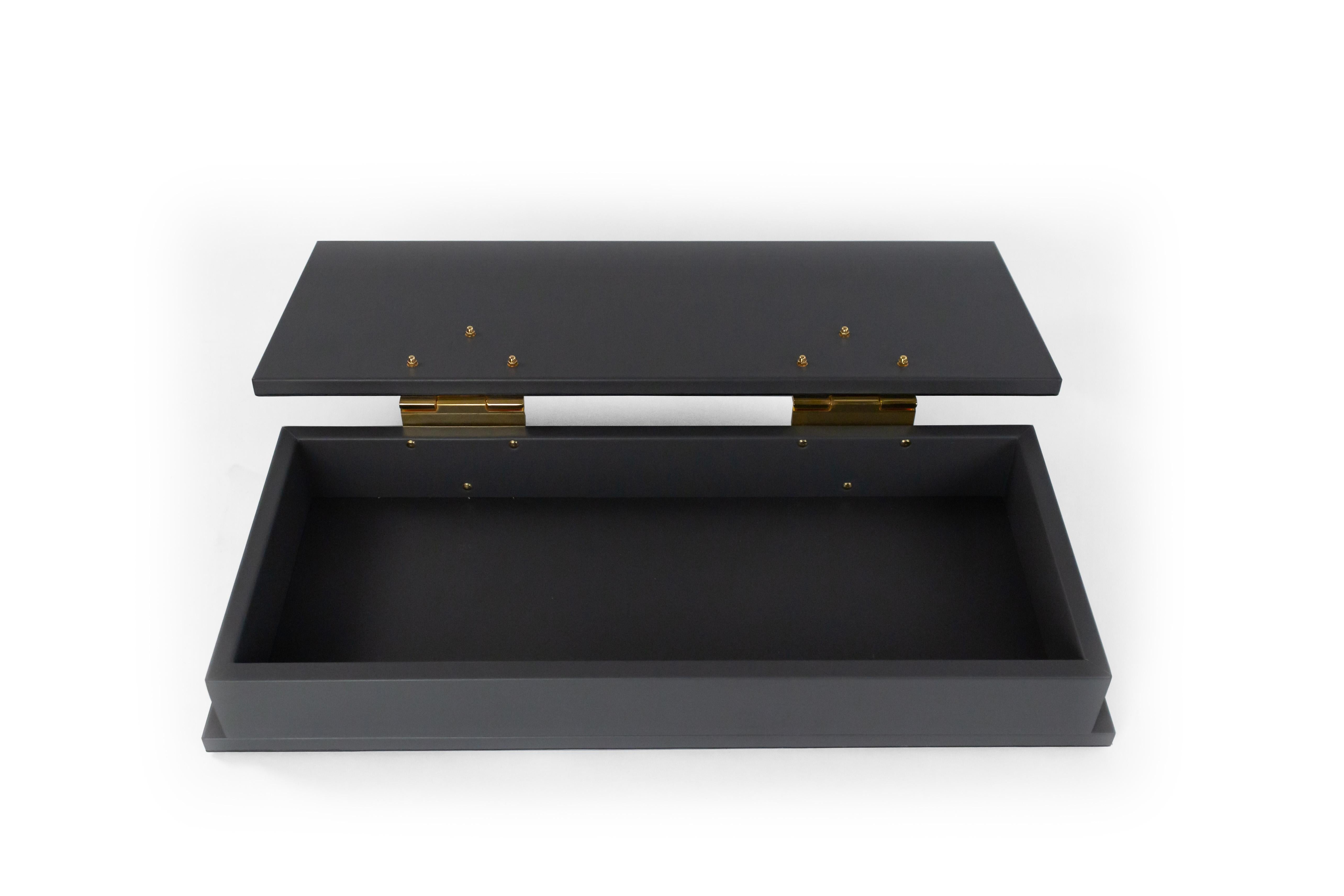 Contemporary rectangular dark gray leather box with two large brass hinges (Made in Italy).
      