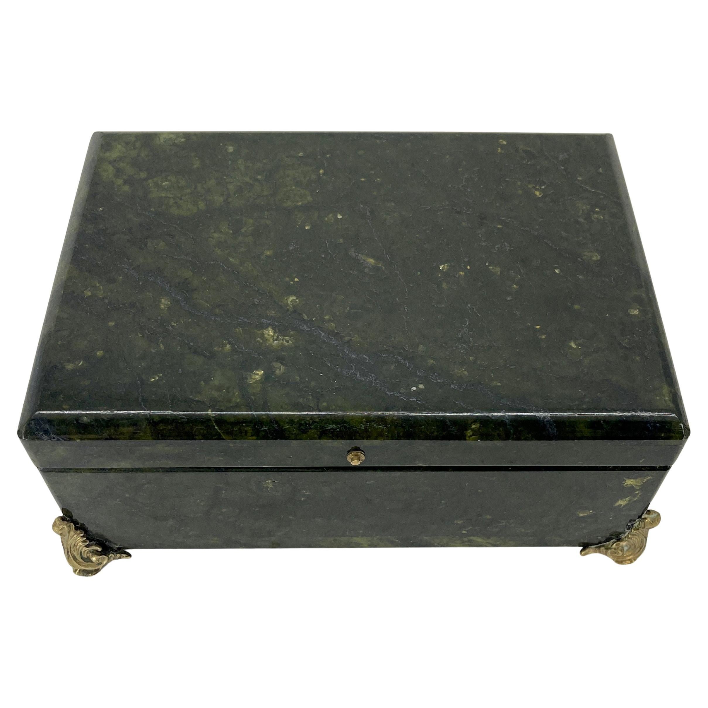 Vintage Deep Forrest Green Marble Jewelry Box on Bronze Feet, Italy.
This rectangular box has vintage blue velvet interior and the original bronze hardware.

