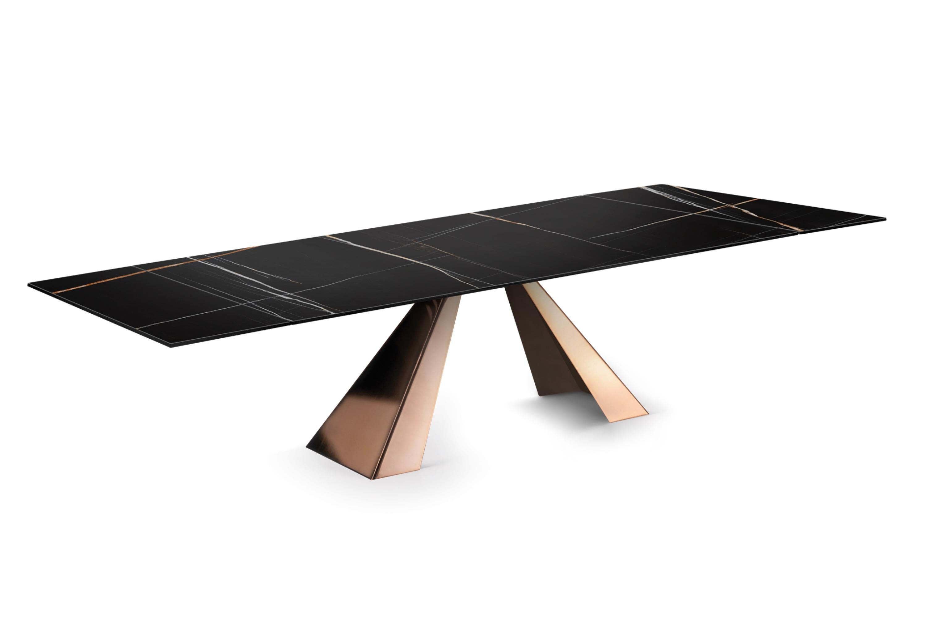 The Delta dining table represents the perfect harmony of contemporary elegance and practical engineering. Designed to accommodate both intimate meals and grand gatherings, Delta transforms any dining space into a refined, functional