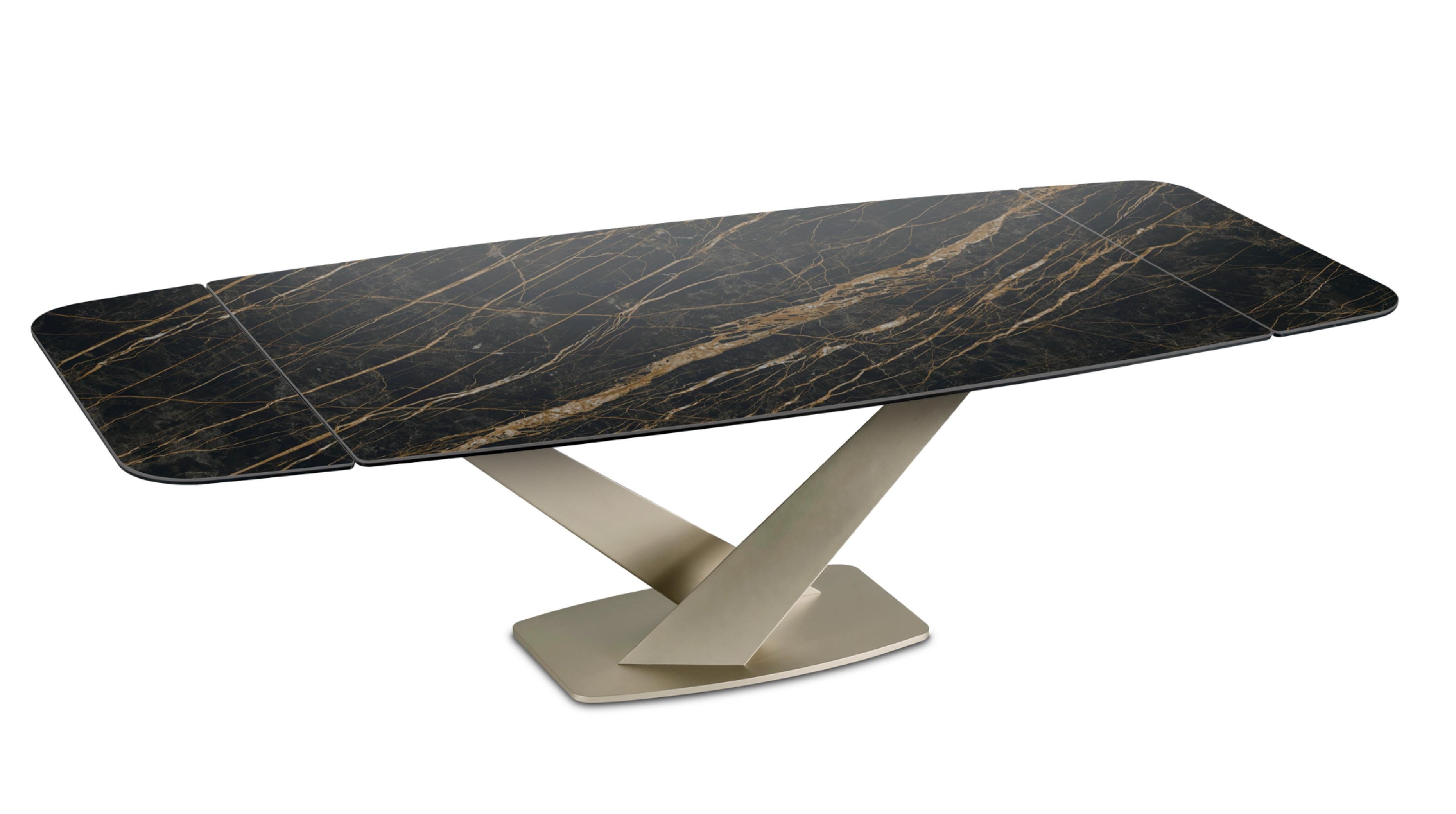 NAOS – Extendable Dining Table
Design: Y. Hatano

The Naos dining table combines contemporary elegance with advanced functionality, making it the centerpiece of any living space. Perfect for modern interiors, its refined design and integrated