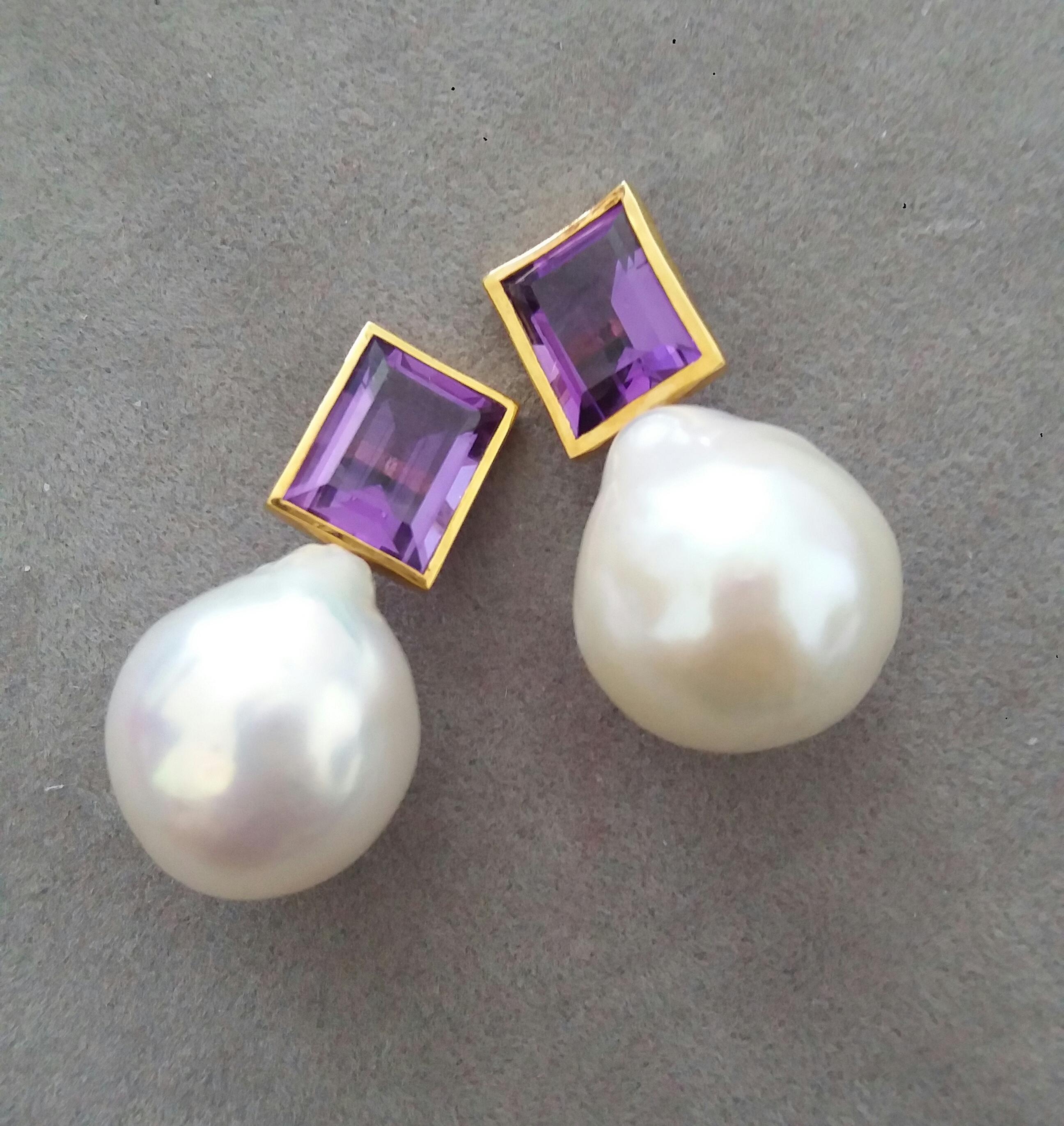 These simple but elegant Handmade Earrings have 2 faceted rectangular and perfectly clean Natural Amethysts measuring 9x11 mm and weighing 6 carats set in yellow gold bezel at the top to which are suspended 2  unusual Big Size White Baroque Pearls