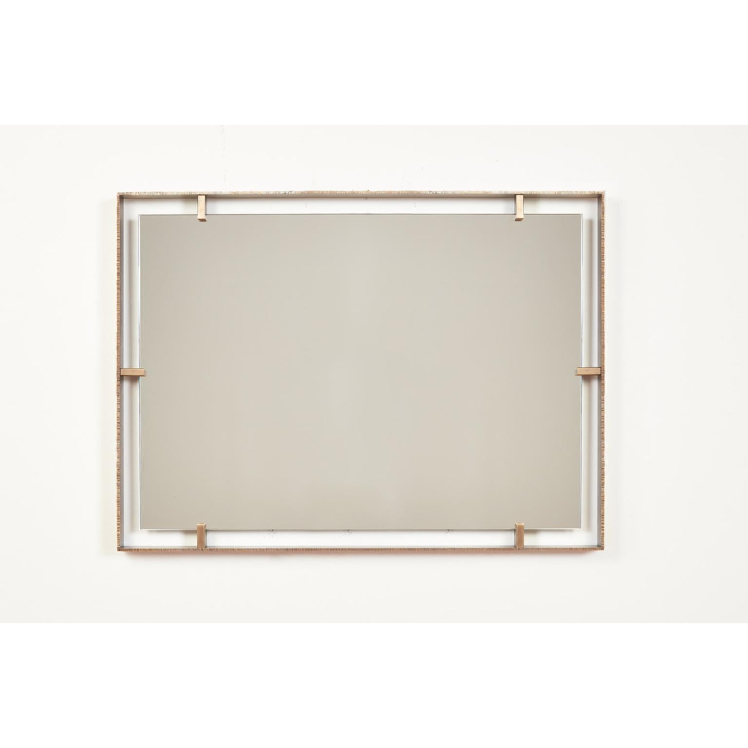 Rectangular Gauged Edge Mirror by William Emmerson
Dimensions: D 5,1 x W 106,7 x H 76,2 cm.
Materials: Brass and glass.
 
Introducing 