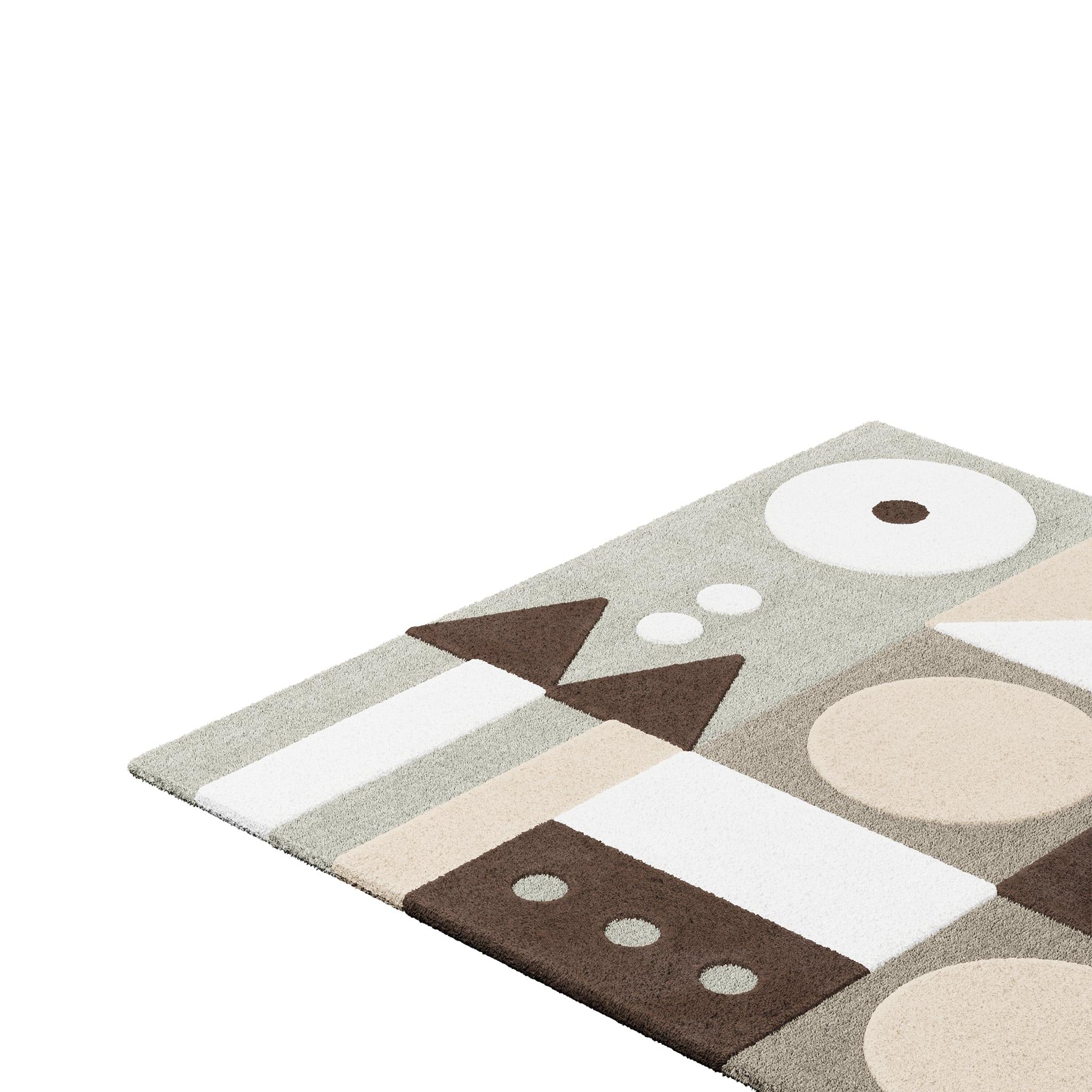Tapis Pastel #13 is a pastel rug that mixes mid-century modern vibes with Memphis Design style. The combination of muted hues adds brightness and comfort to any room. 
This pastel area rug has a square shape and a playful pattern that creates a
