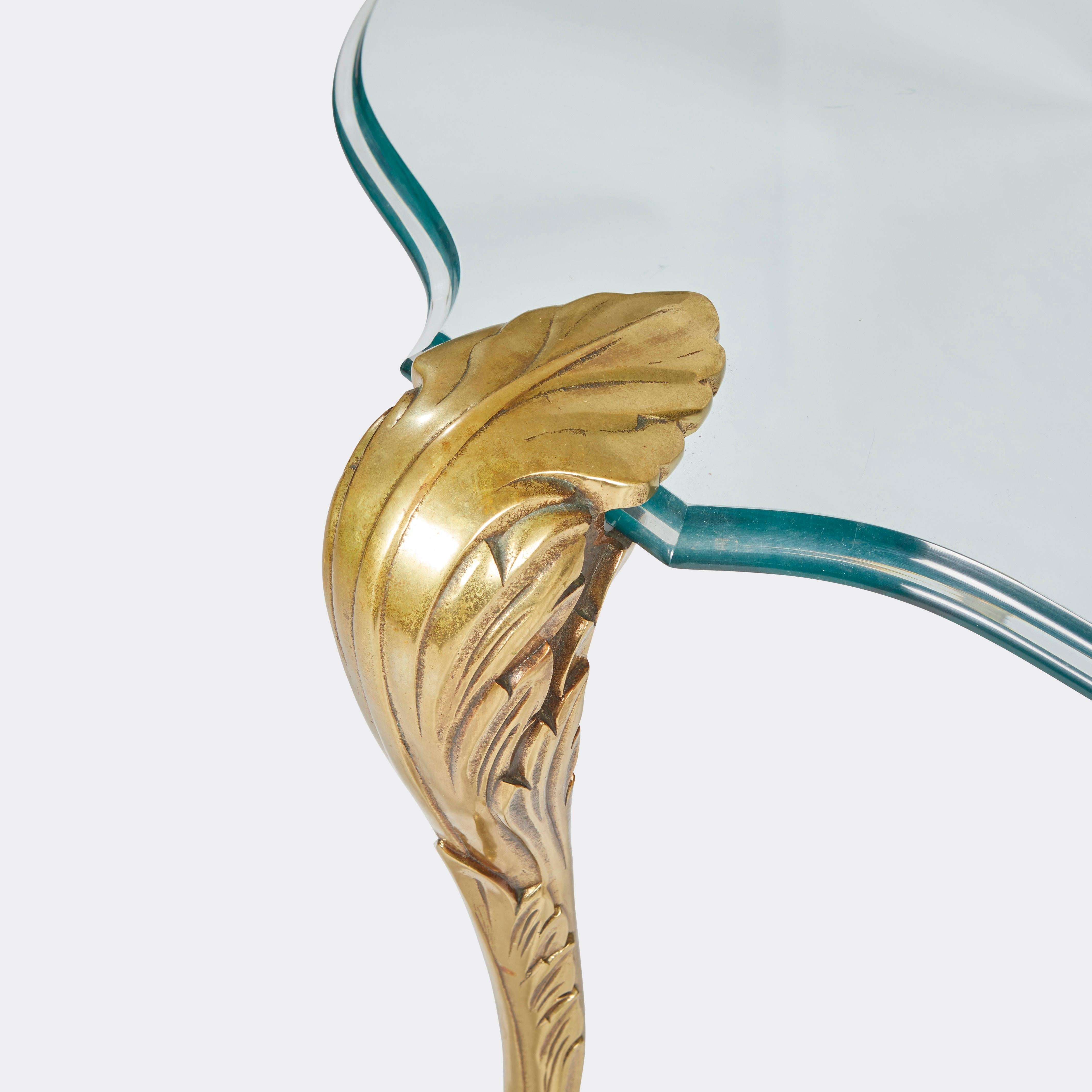 glass table with brass legs