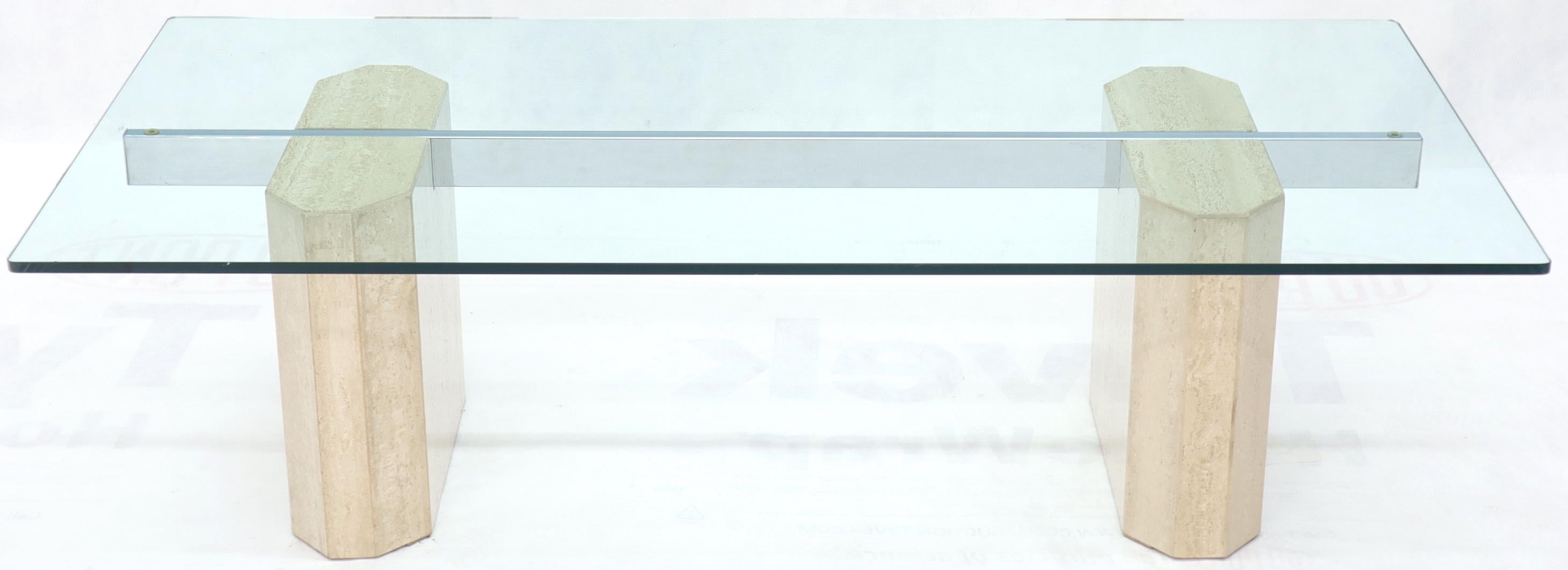 Mid-Century Modern rectangular glass top travertine base coffee table.