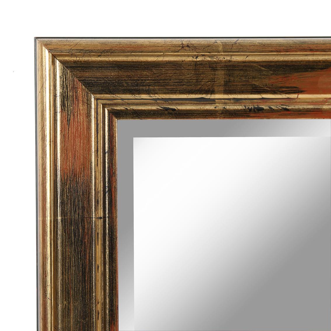 A rectangular gold leaf beveled mirror with black and red undertones.