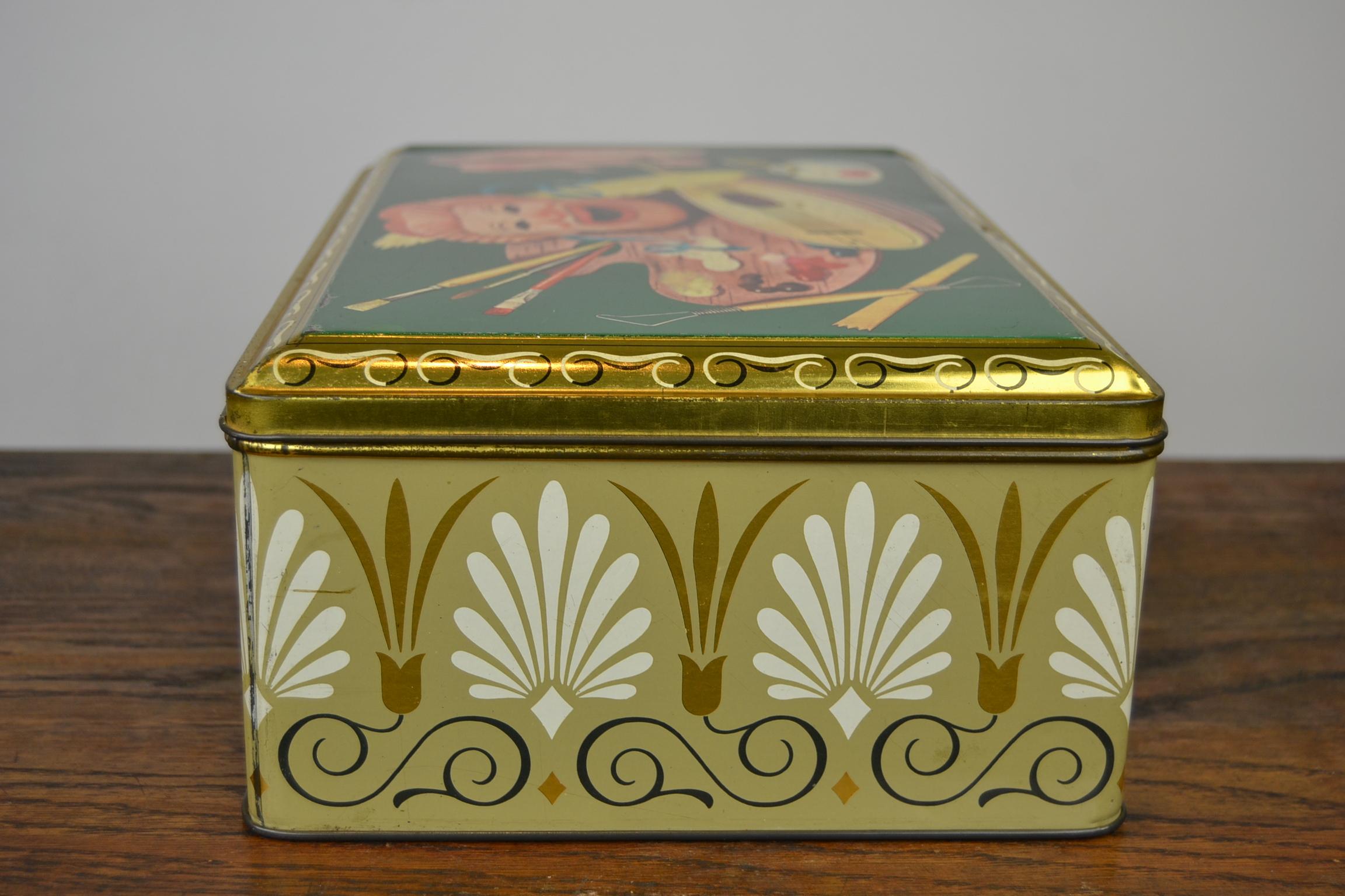 Arts and Crafts Rectangular Green Storage Tin with Mask, Ballet Shoes, Inkwell, Painting Pallet