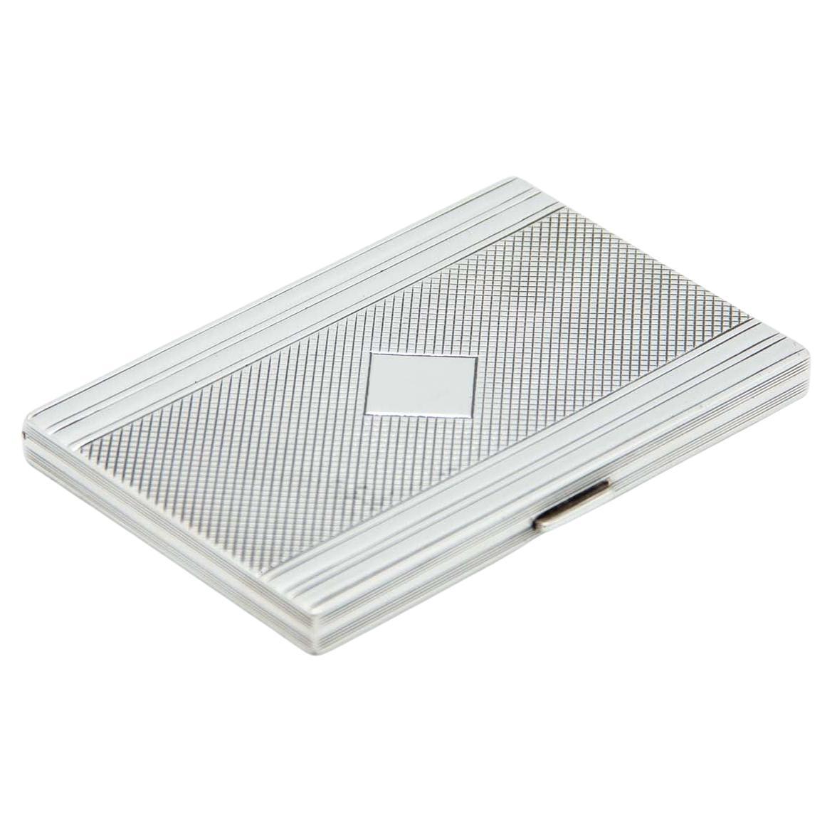 Rectangular guilloche silver case with diamond relief and monogram