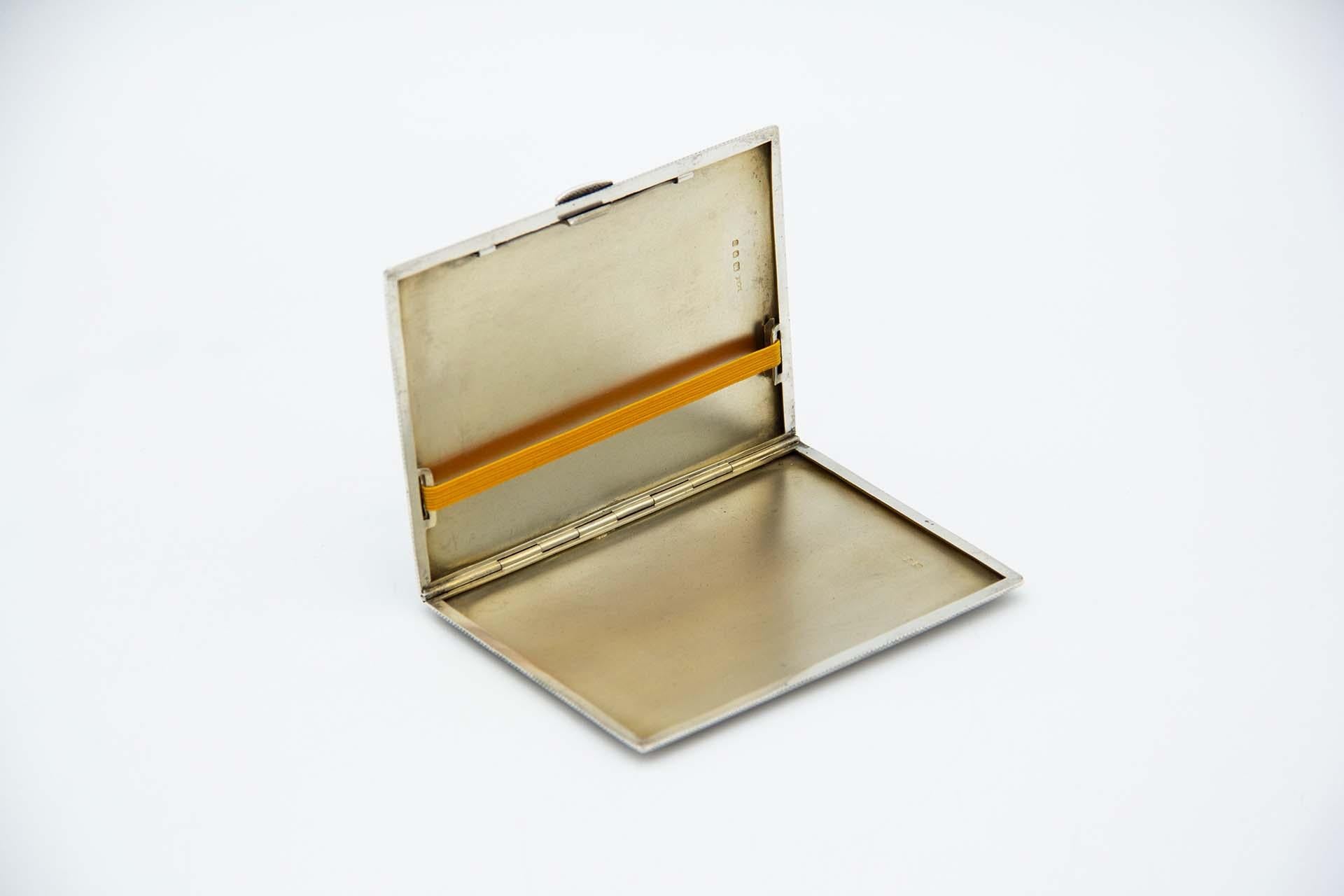 European Rectangular guilloche silver cigarette case with spring lid and gold interior For Sale