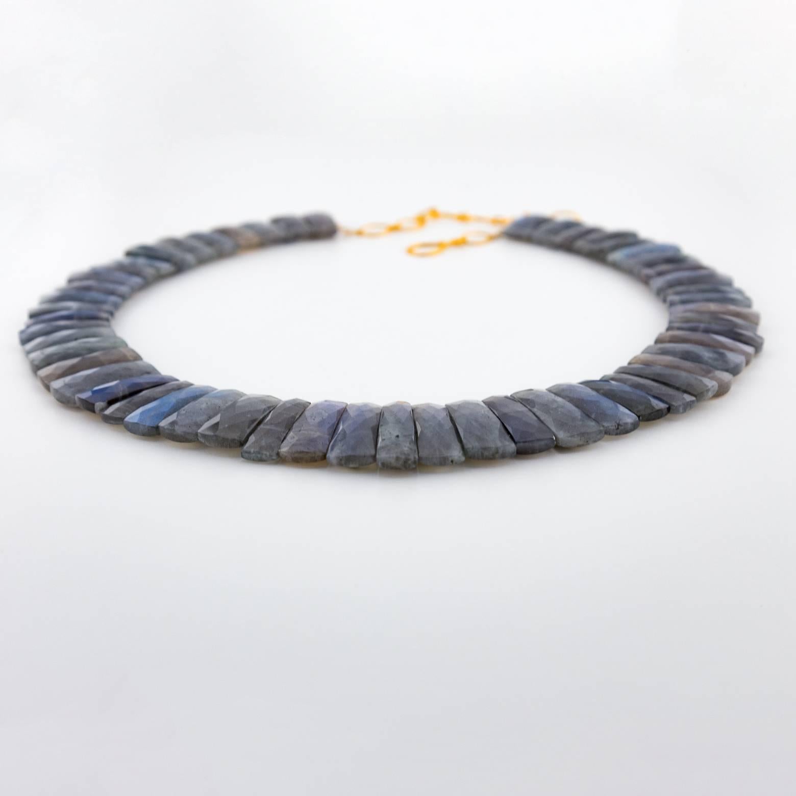 This beautiful Labradorite necklace is natural elegance. It has a great weight to it. The iridescence of it captures the light is so many different angles that the blue tones absolutely glow! Very regal and very elegant! The clasp and chain are 14