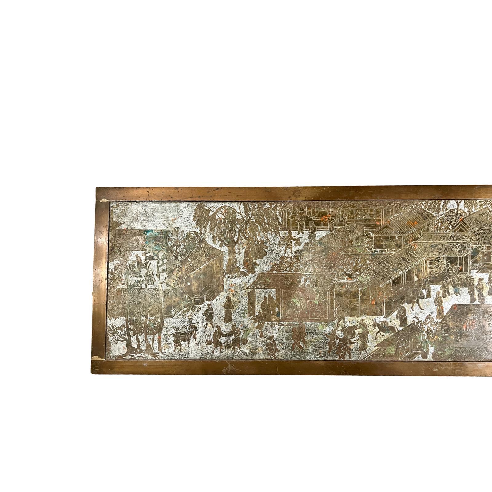 A circa 1960's rectangular LaVerne coffee table with palace scenes and original silver plated and patinated finish.

Measurements:
Height: 15.5