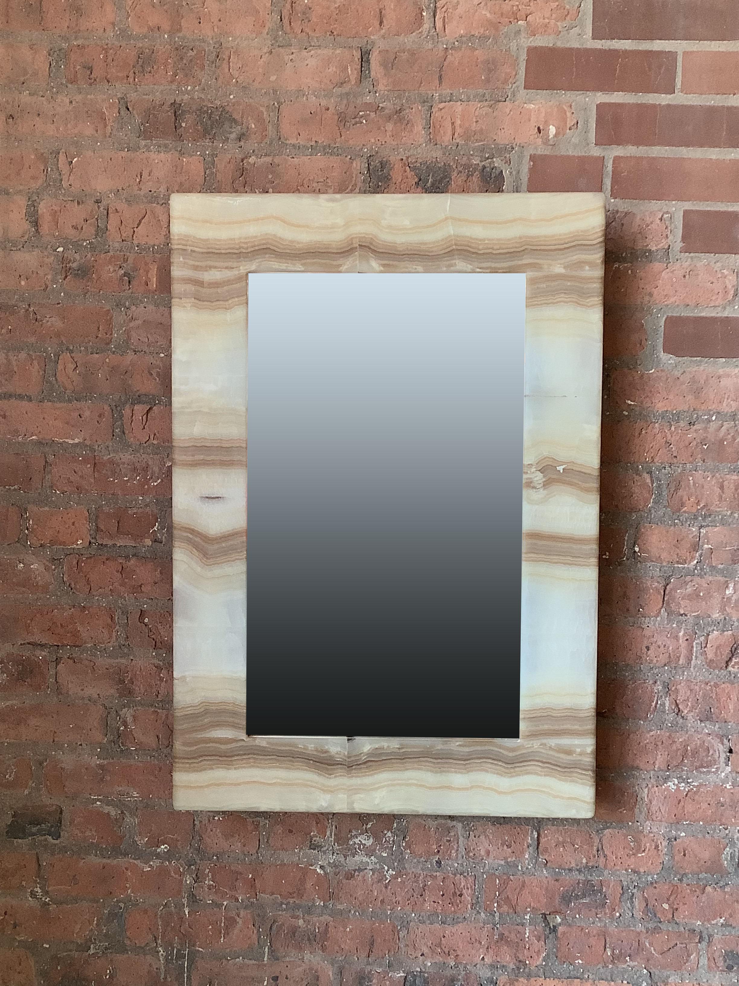 Rectangular mirror with thick frame made from Onyx.

Onyx Mirrors

Although there are a few other places in the world where the semi-precious stone Onyx exist, we found our collection in Mexico.

A Bit of Information on the Semi-Precious Stone