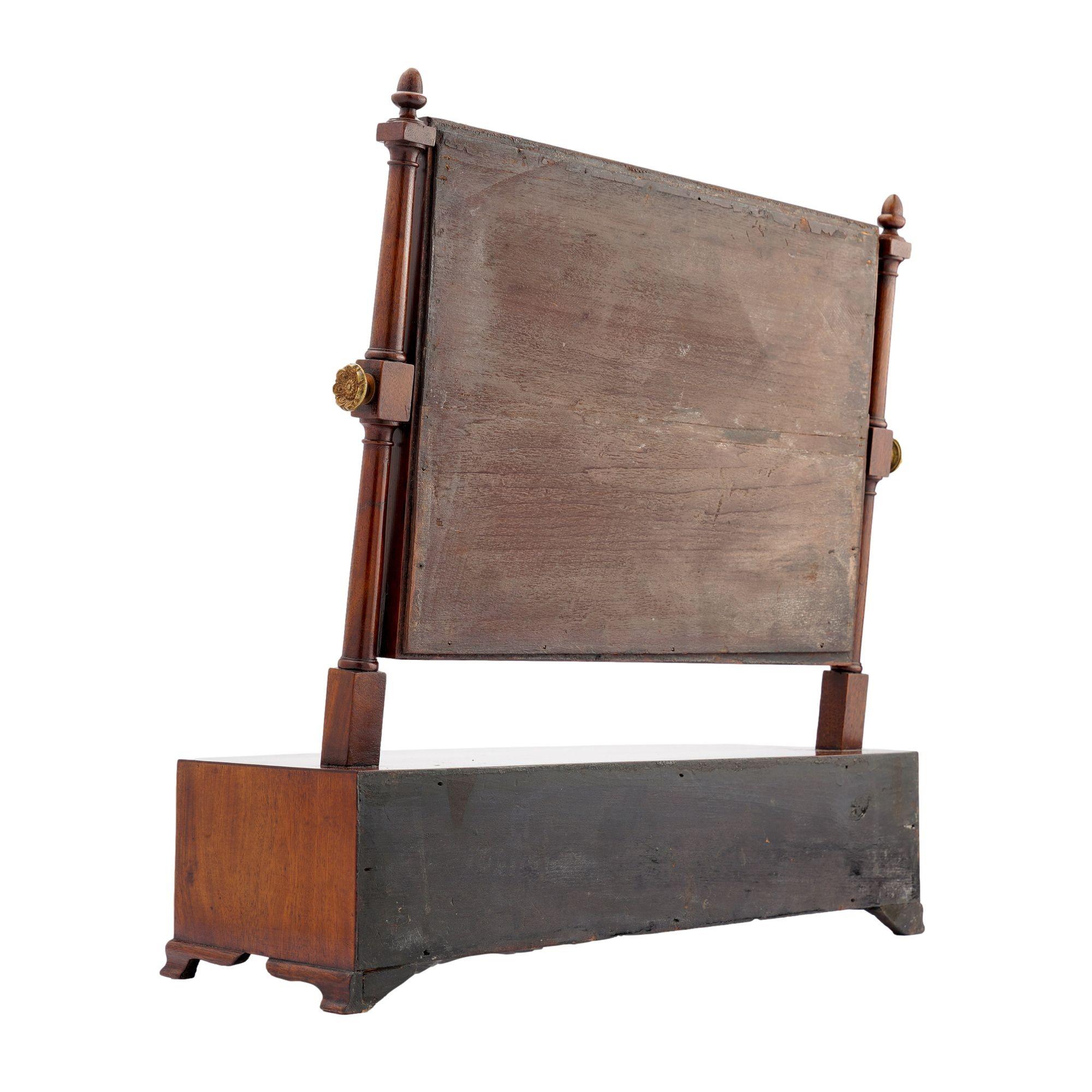 18th Century Rectangular mahogany swinger dressing mirror on a bow front stand, 1790 For Sale