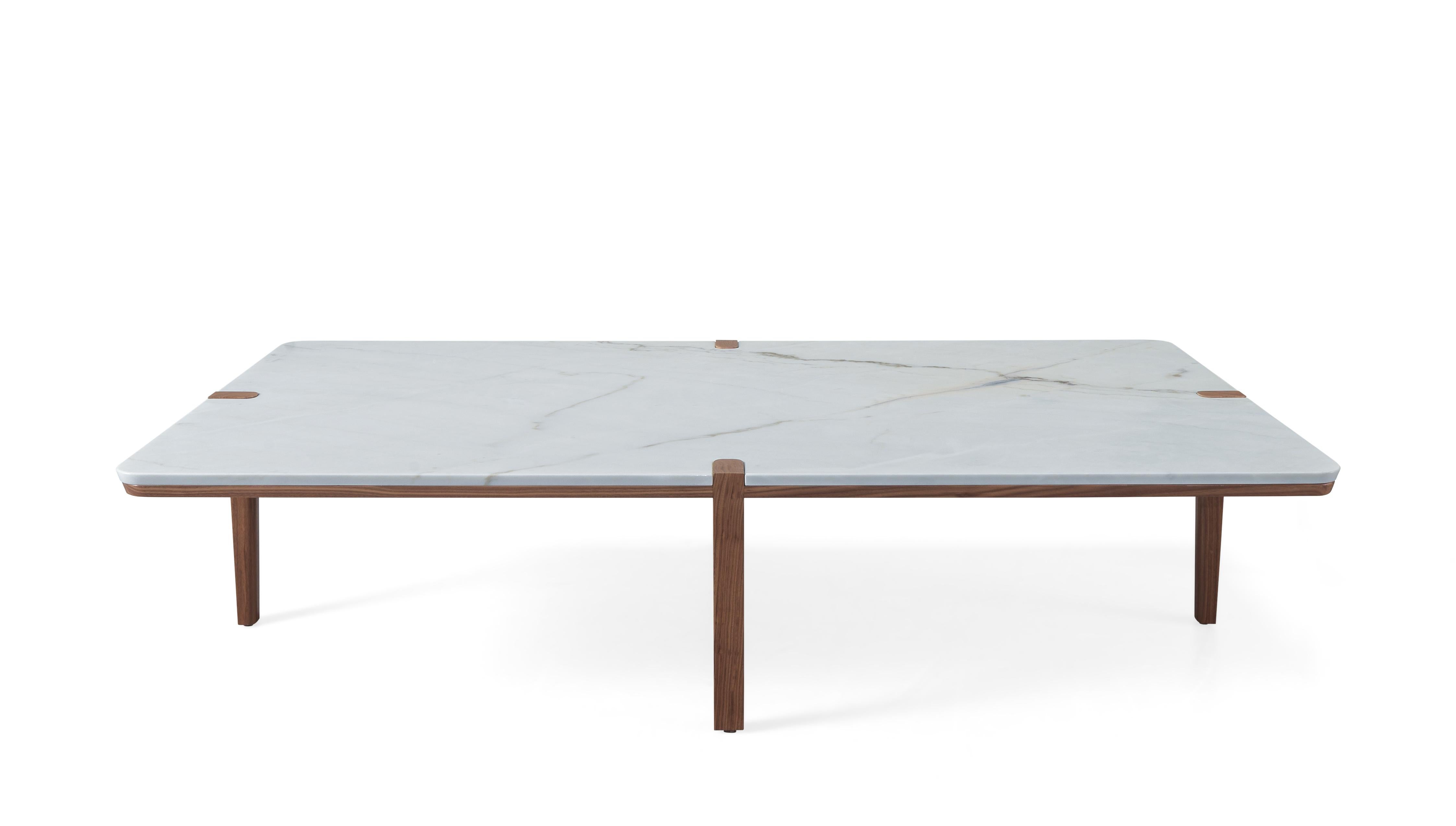 Beautiful corner tables, were designed to disrupt the classic position of the legs of most of the tables, putting it on a particular position that assures the stability and leaves the corners free.
Made in wood (walnut or oak) and marble