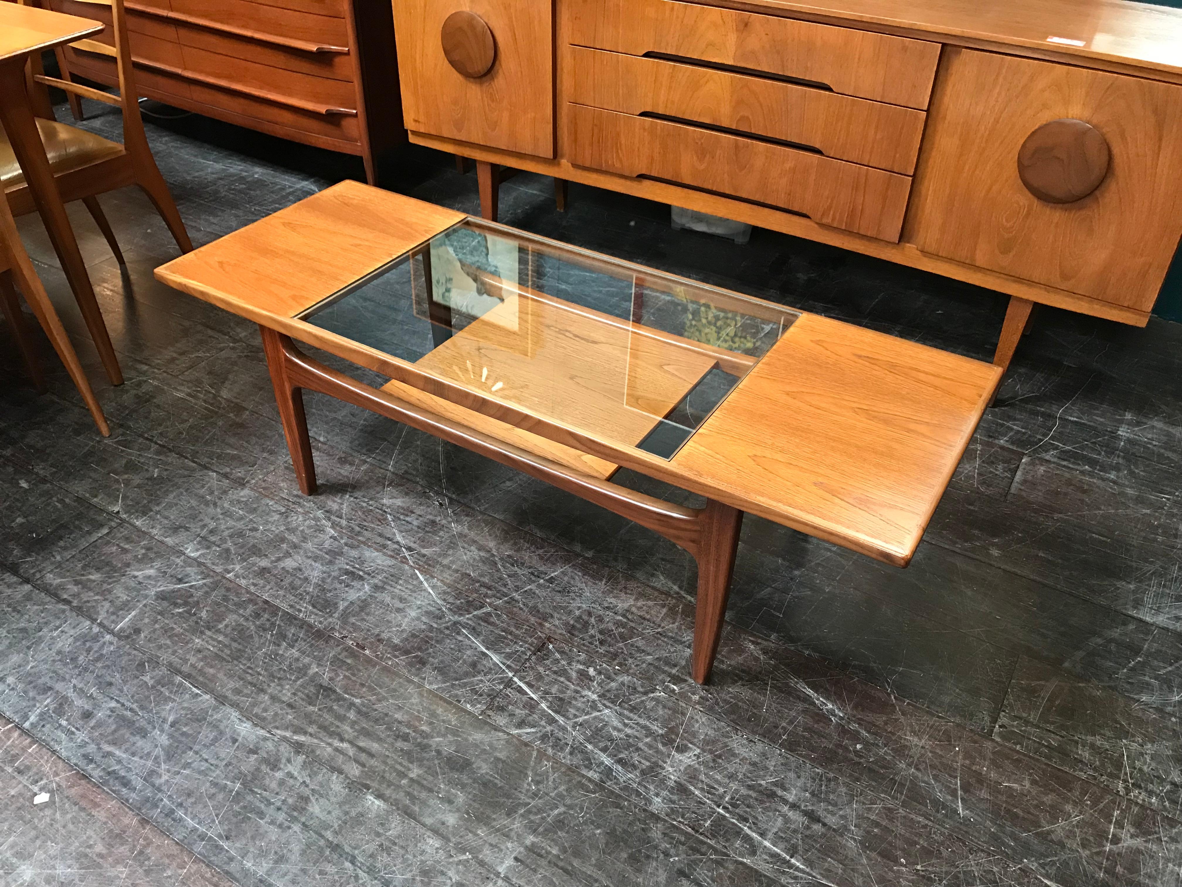 A vintage teak coffee table made by G Plan in the 1960s. This ultra cool retro coffee table is often now referred to as the ‘Mad Men’ table due to its regular appearances in the hit television series of the same name. It’s such an elegant piece of