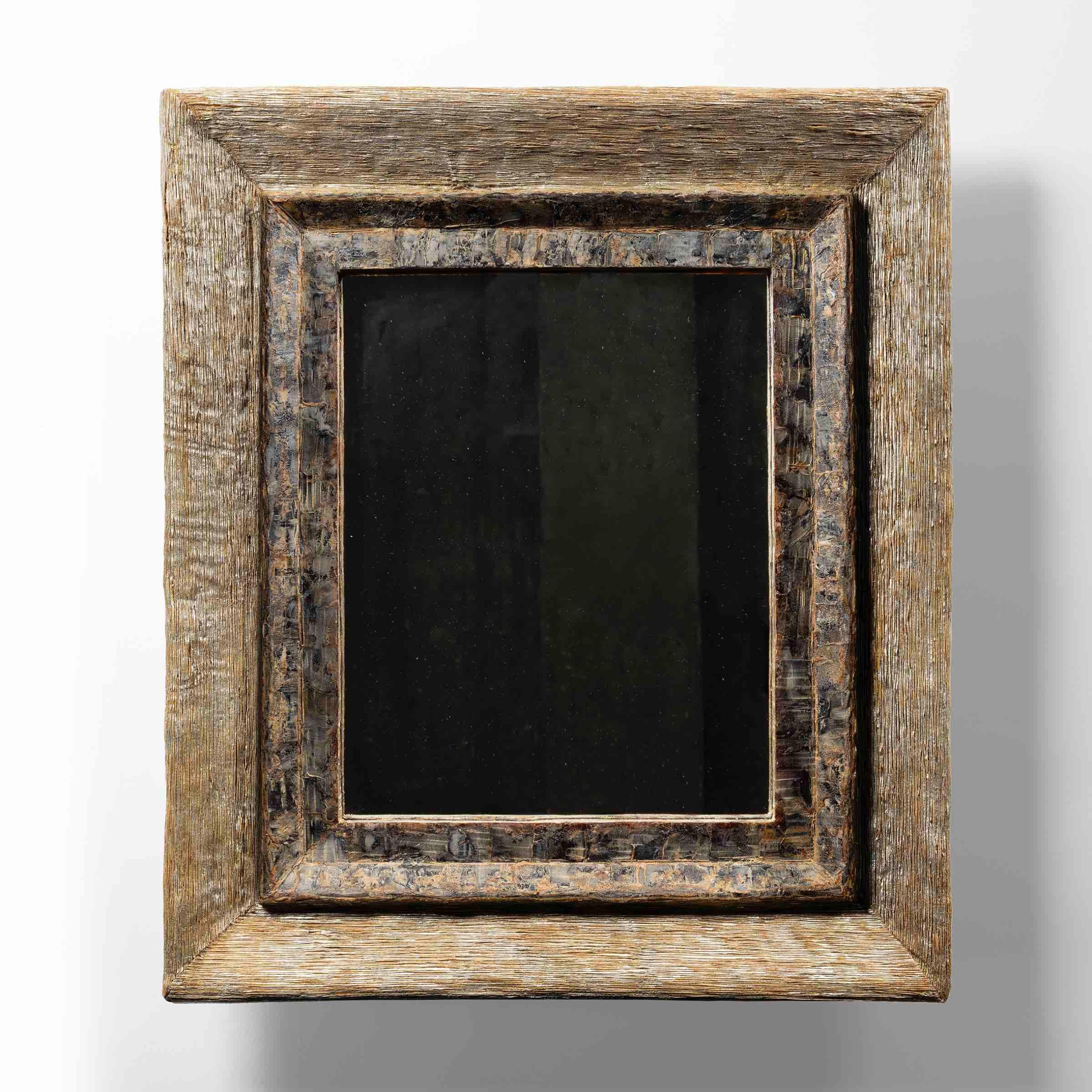 Rectangular mirror by Line Vautrin.
Structure in light tortoiseshell coloured talosel covered with lumaline threads on its outer frame by Line Vautrin.
The interior frame is worked in an Africanist spirit or “art-brut”.
Flat central mirror.
Unique