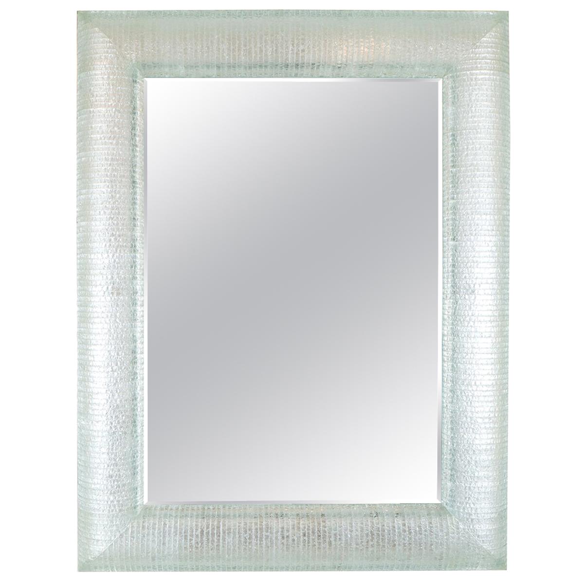 Rectangular Mirror Featuring Curved and Layered Glass Surround