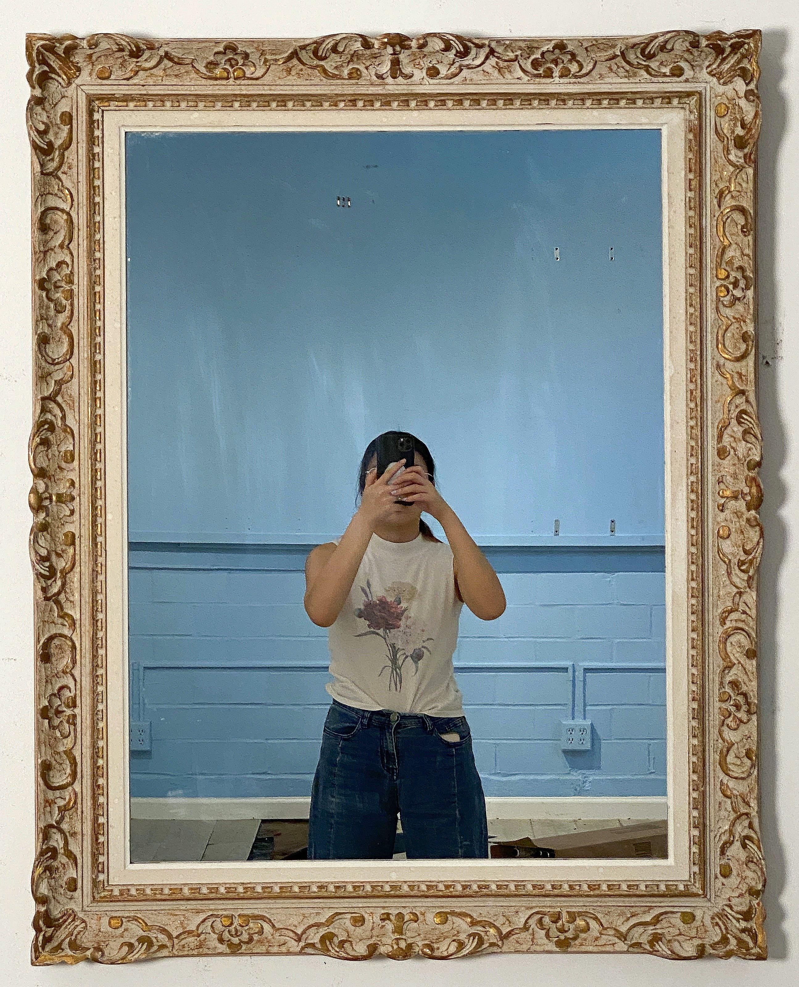 A fine French rectangular wall mirror in a beautiful Montparnasse carved wooden frame.

H 39 3/8 inches x W 31 1/8 inches

Can be displayed verically (portrait) or horizontally (landscape).

The Montparnasse frame takes its name from the Parisian