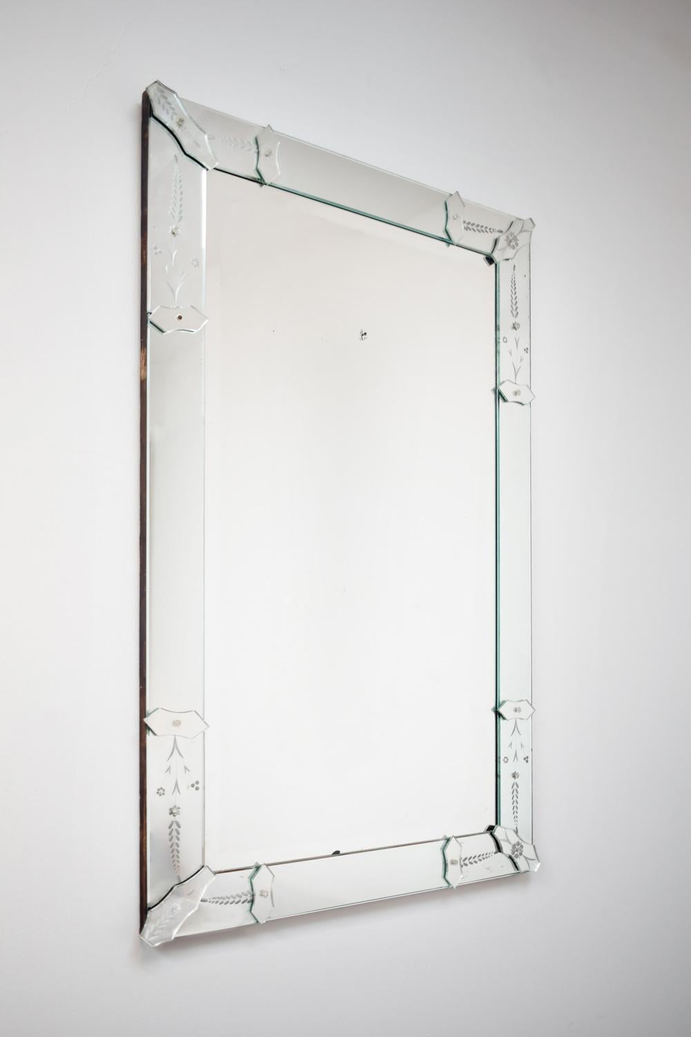 Space Age Rectangular mirror in the style of Venice, the border engraved with floral decor