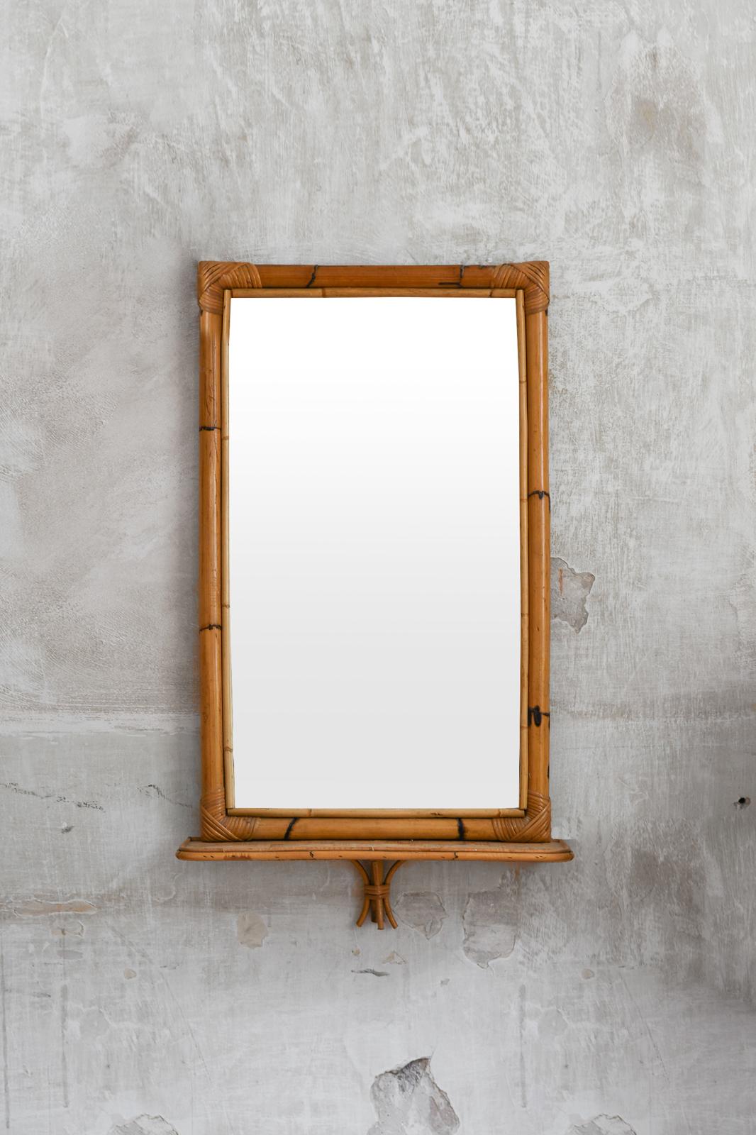 Rectangular mirror with pressed bamboo shelf and bamboo cane frame, natural finish – Italy 1970
Product details
Dimensions: 61 W x 104 H x 18 D cm