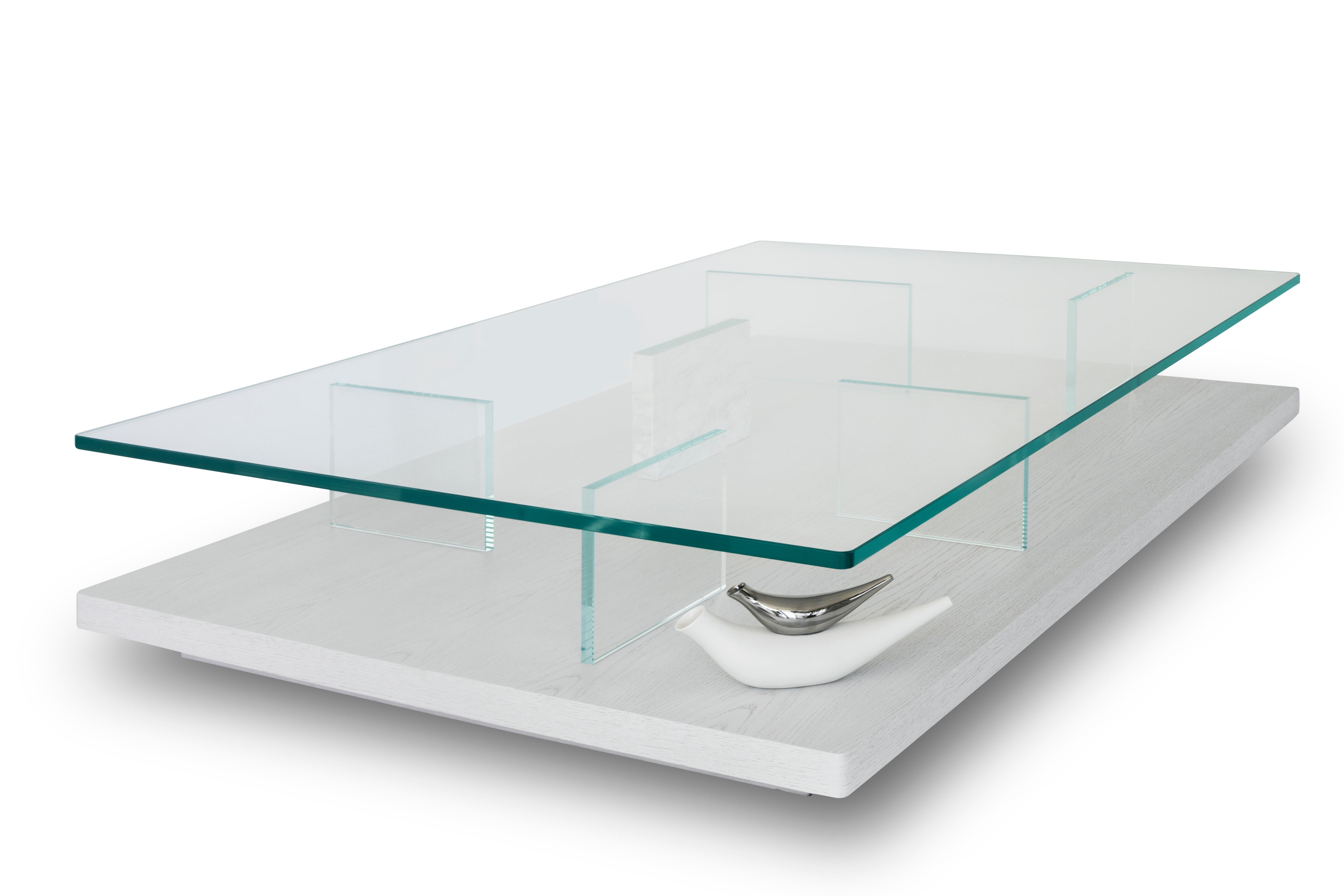 The clear and purist design of the Puro coffee table follows a modern approach that elevates the combination of wood and glass with a protagonist divider of Italian marble.

As shown wood: White milk oak glass: Clear marble: Calacatta