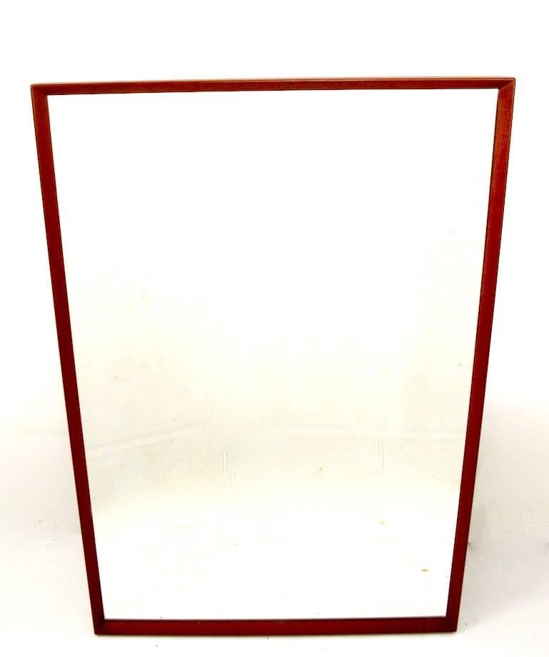 Large rectangular teak framed mirror, simple rationalist design, original, clean ready to install condition. Wood frame approximately 1 inch W.