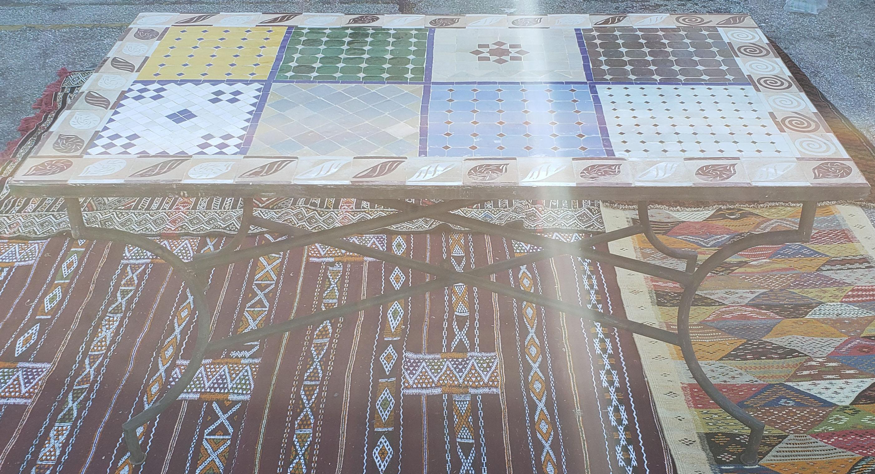 A new arrival. 100 % glazed square. Sampler pattern.
Multi-color Sampler Moroccan mosaic dining room table (for up to 6 people) measuring approximately 32