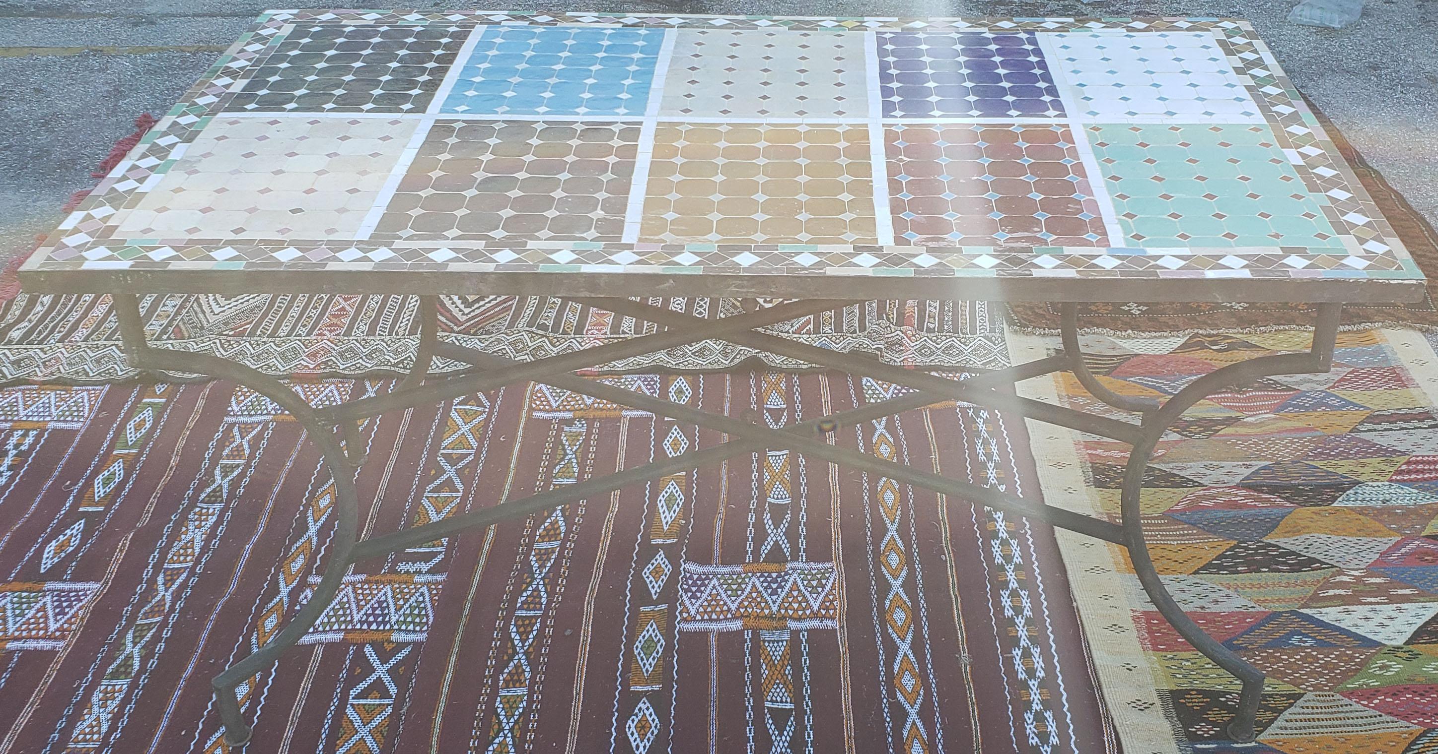 A new arrival. 100 % glazed square. Sampler pattern.
Multi-color Sampler Moroccan mosaic dining room table (for up to 6 people) measuring approximately 32