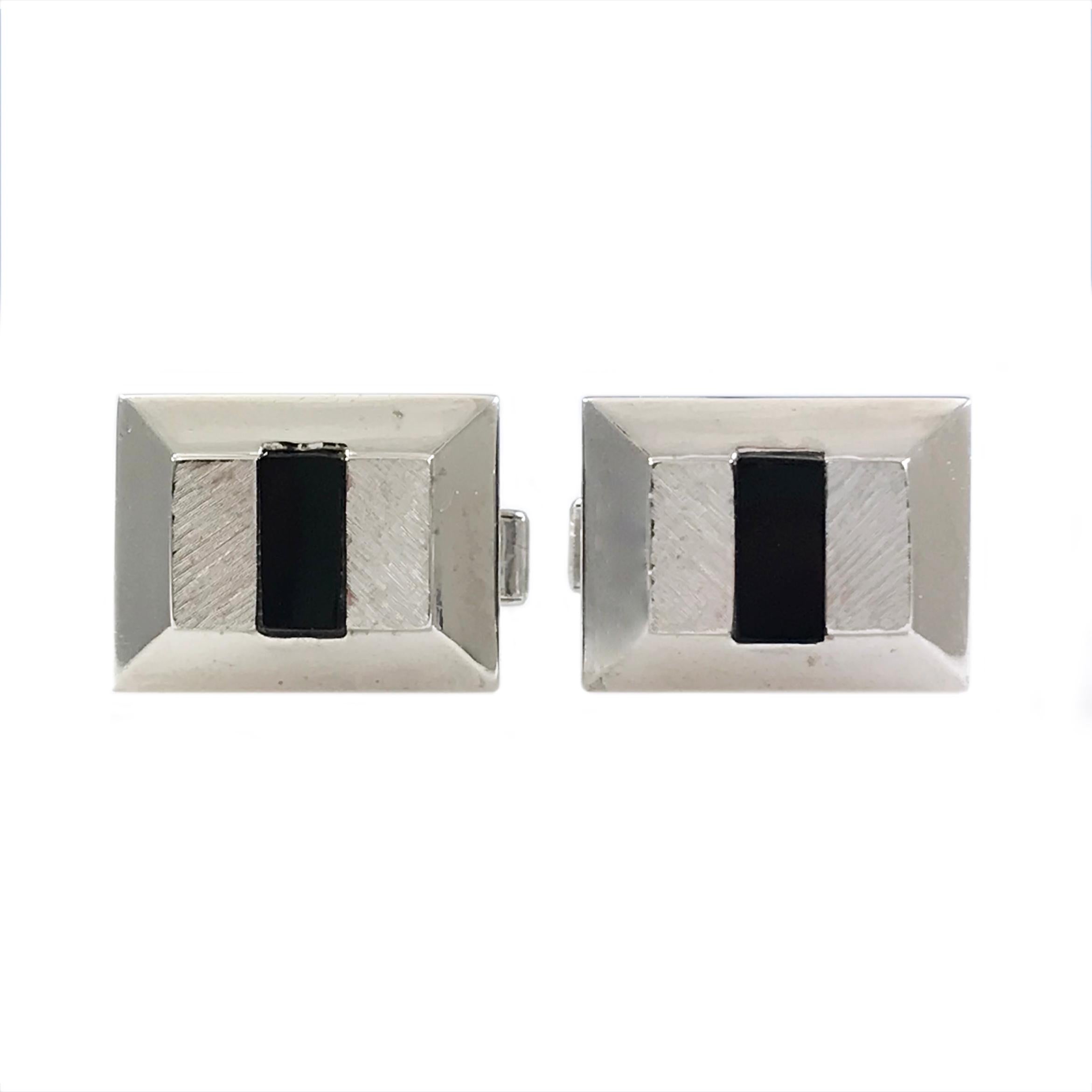 Rectangular Onyx White Gold Cufflinks. The cufflink fronts are a truncated pyramid with a rectangular Onyx flush set in the center, the opposite sides are angle satin finished and the rest of the cufflinks are high polish finished. The cufflinks