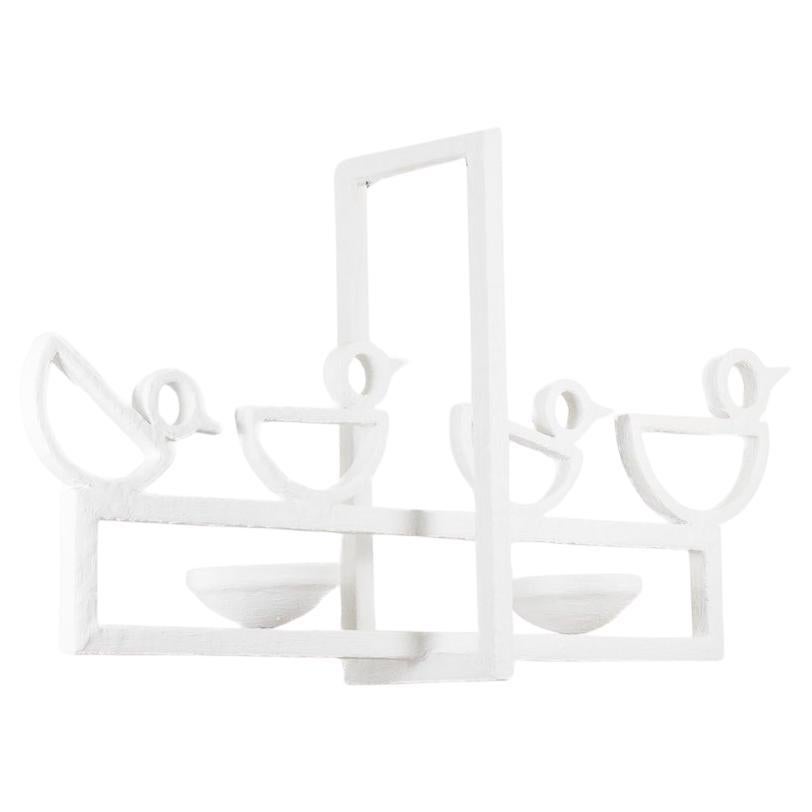 Rectangular plaster chandelier decorated with birds.