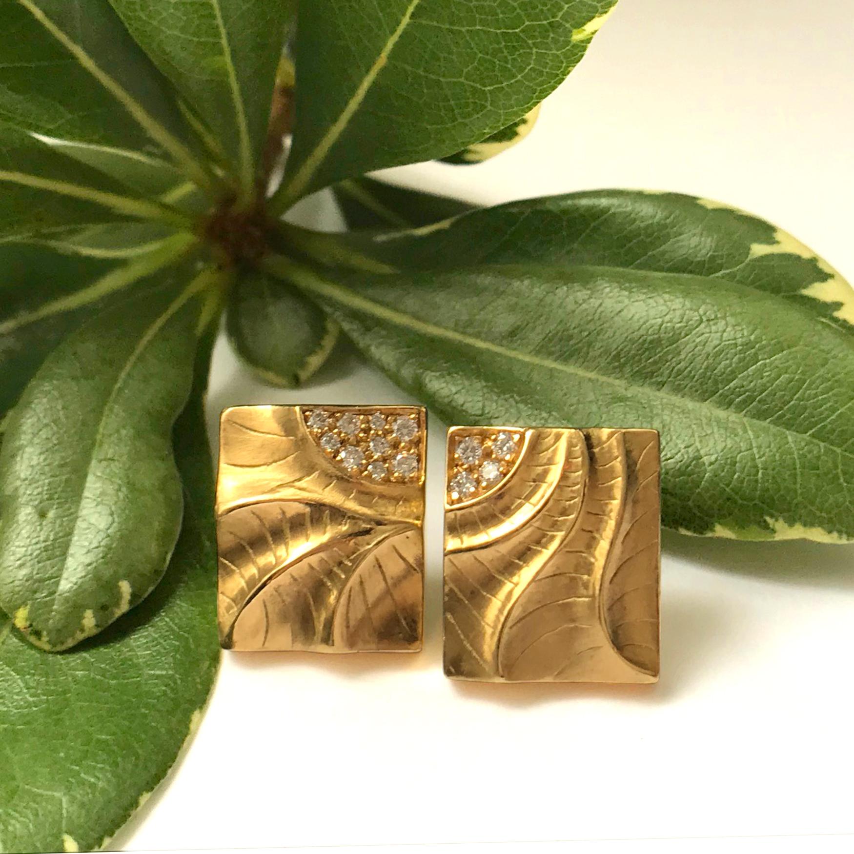 K.Mita's hand carved Rectangular Puzzle Earrings -- a different take on her Square Puzzle Earrings -- are an excellent example of her Sand Dune Collection. Endless waves of sand continue from one earring to the next and together form a puzzle. Each