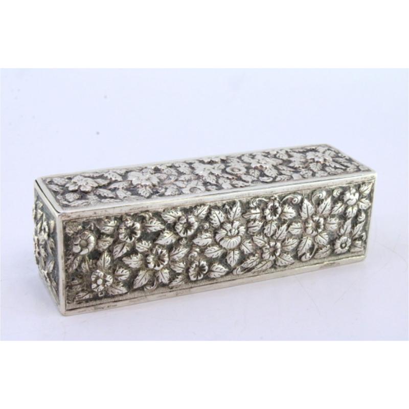 Silver Rectangular silver box with raised floral motifs For Sale