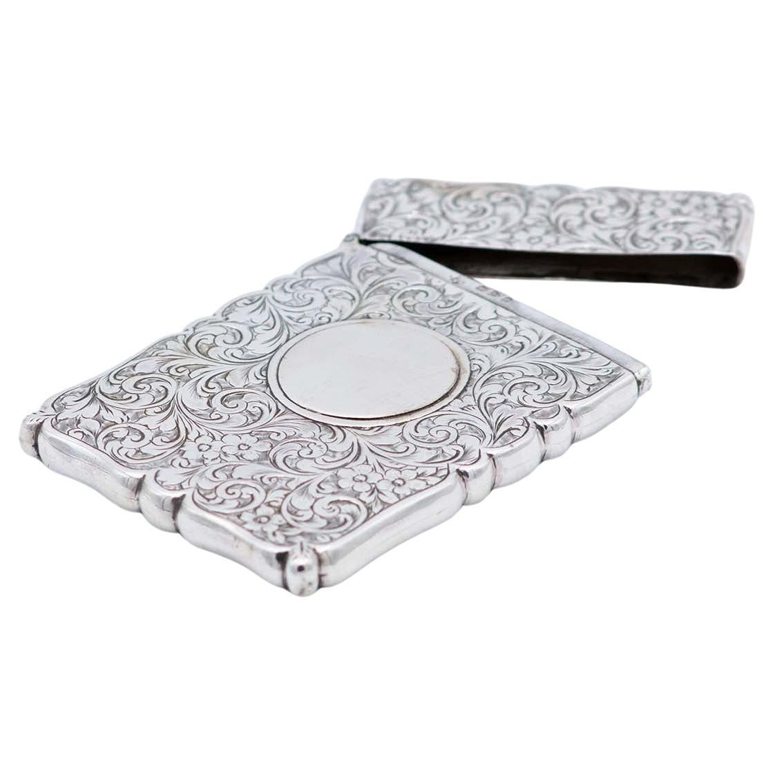 Rectangular silver card case with engravings