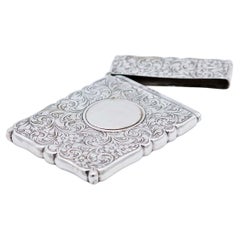 Rectangular silver card case with engravings