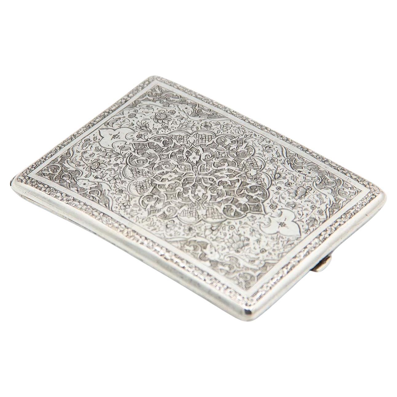 Rectangular silver case with Arabic-style reliefs and Islamic symbols