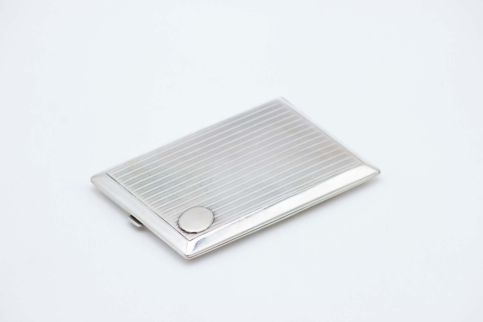European Rectangular silver case with raised bands, monogram insert and gold interior For Sale