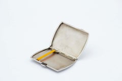 Rectangular silver cigarette case w/ guilloche pattern surrounding monogram card