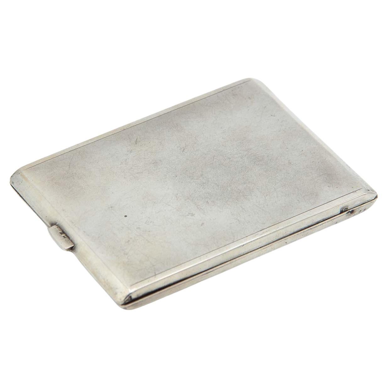 Rectangular silver cigarette case with asymmetrical patterns