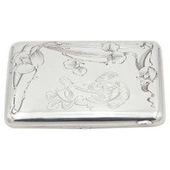 Rectangular silver cigarette case with beveled corners Rectangular silver cigarette case with beveled corners