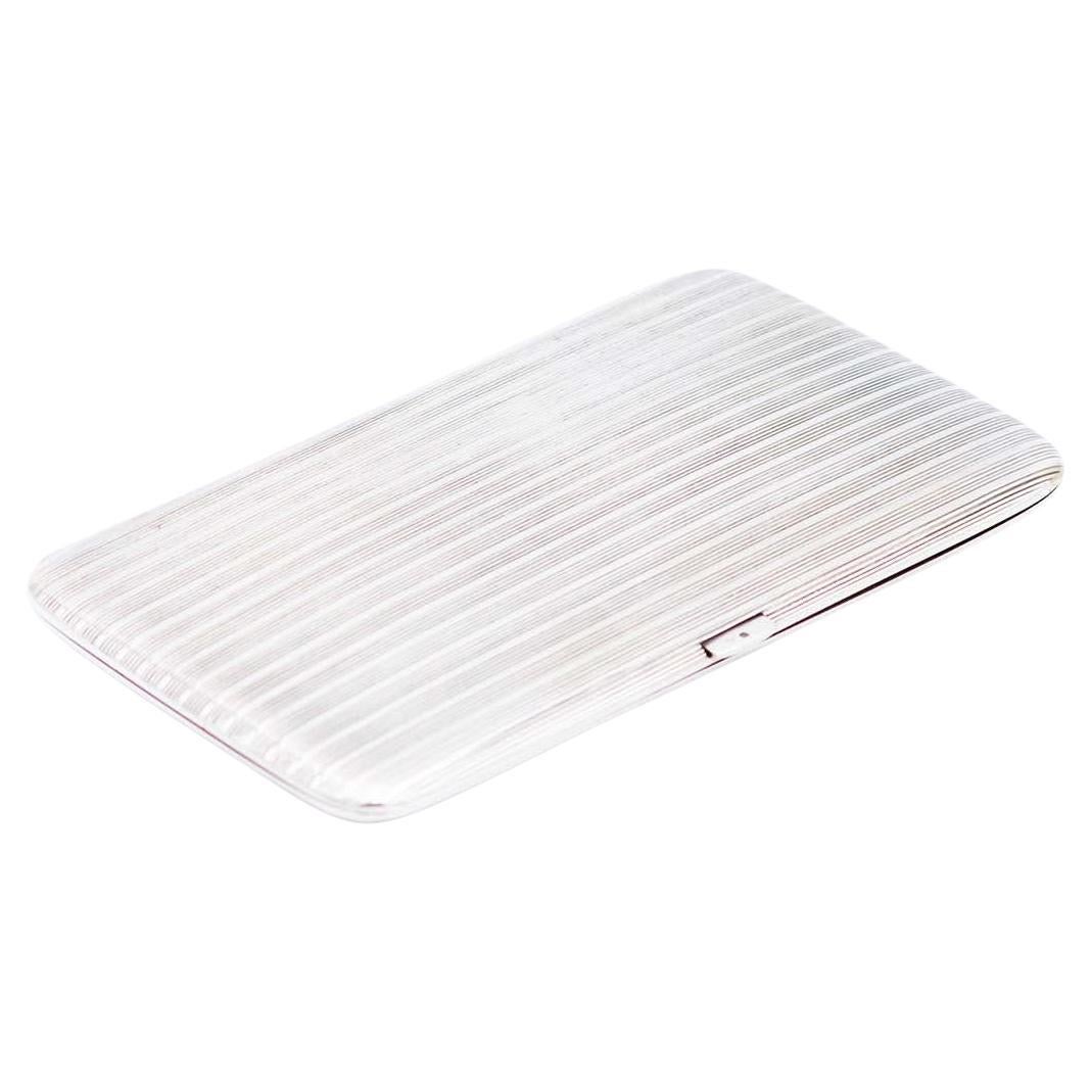 Rectangular silver cigarette case with crimped bands at the top and a hinged lid