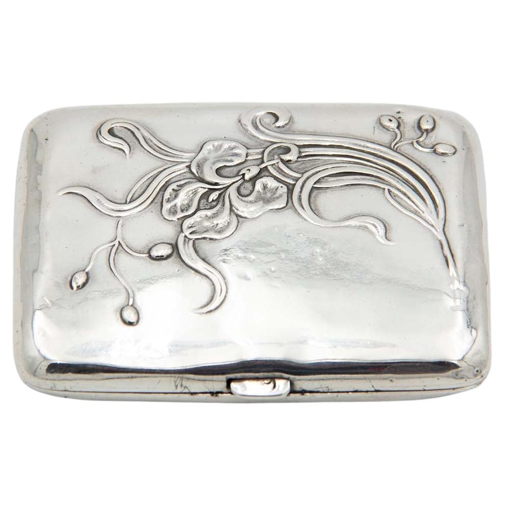 Rectangular silver cigarette case with flower bouquet