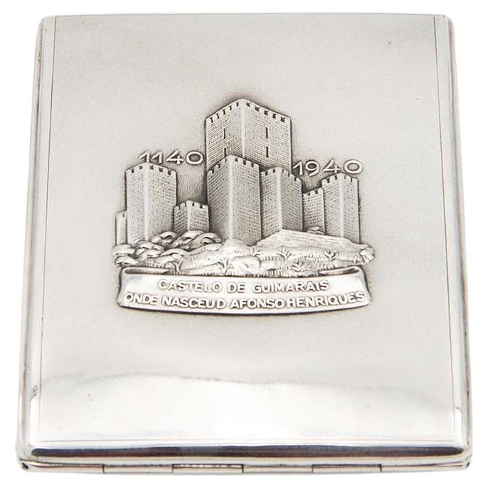 Rectangular silver cigarette case with high reliefs