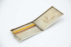 Rectangular silver cigarette case with reliefs alluding to the Belém Tower