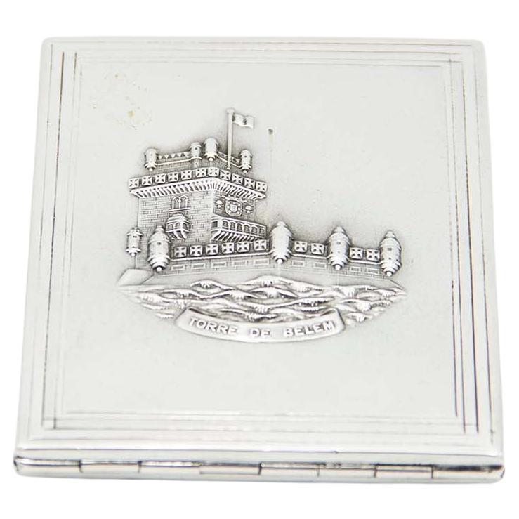 Rectangular silver cigarette case with reliefs alluding to the Belém Tower