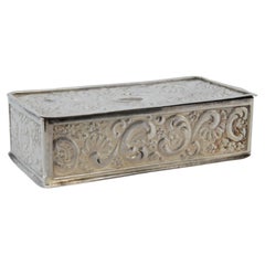 Rectangular silver snuff box w/ shells & scrolls in relief on the removable lid Rectangular silver snuff box w/ shells & scrolls in relief on the removable lid