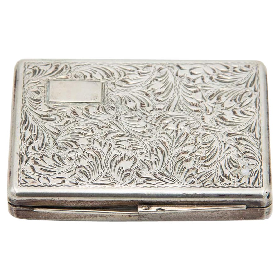 Rectangular silver snuff box with gold interior