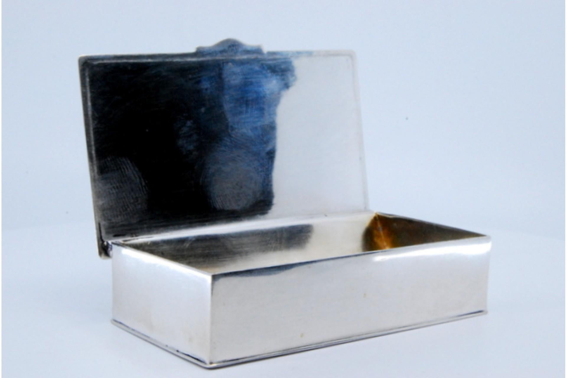 Silver Rectangular silver stamp box with a smooth lid For Sale