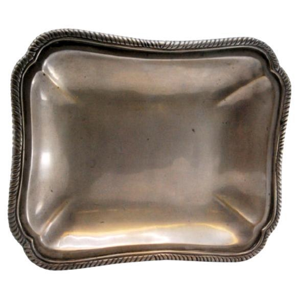 Rectangular silver tray with silver-cut corners and rim with raised friezes For Sale