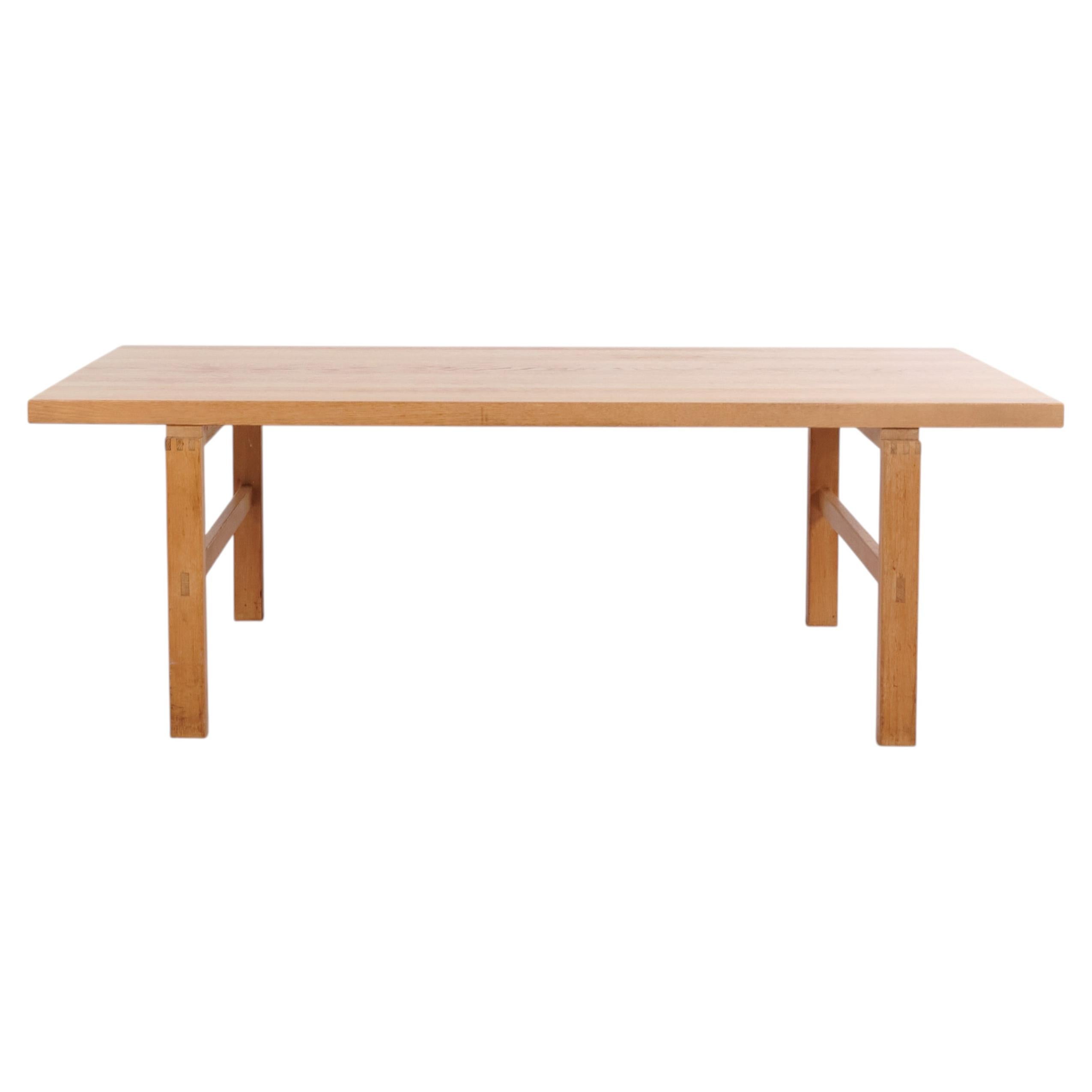 Rectangular solid oak coffee table Danish design from the 1970s For Sale
